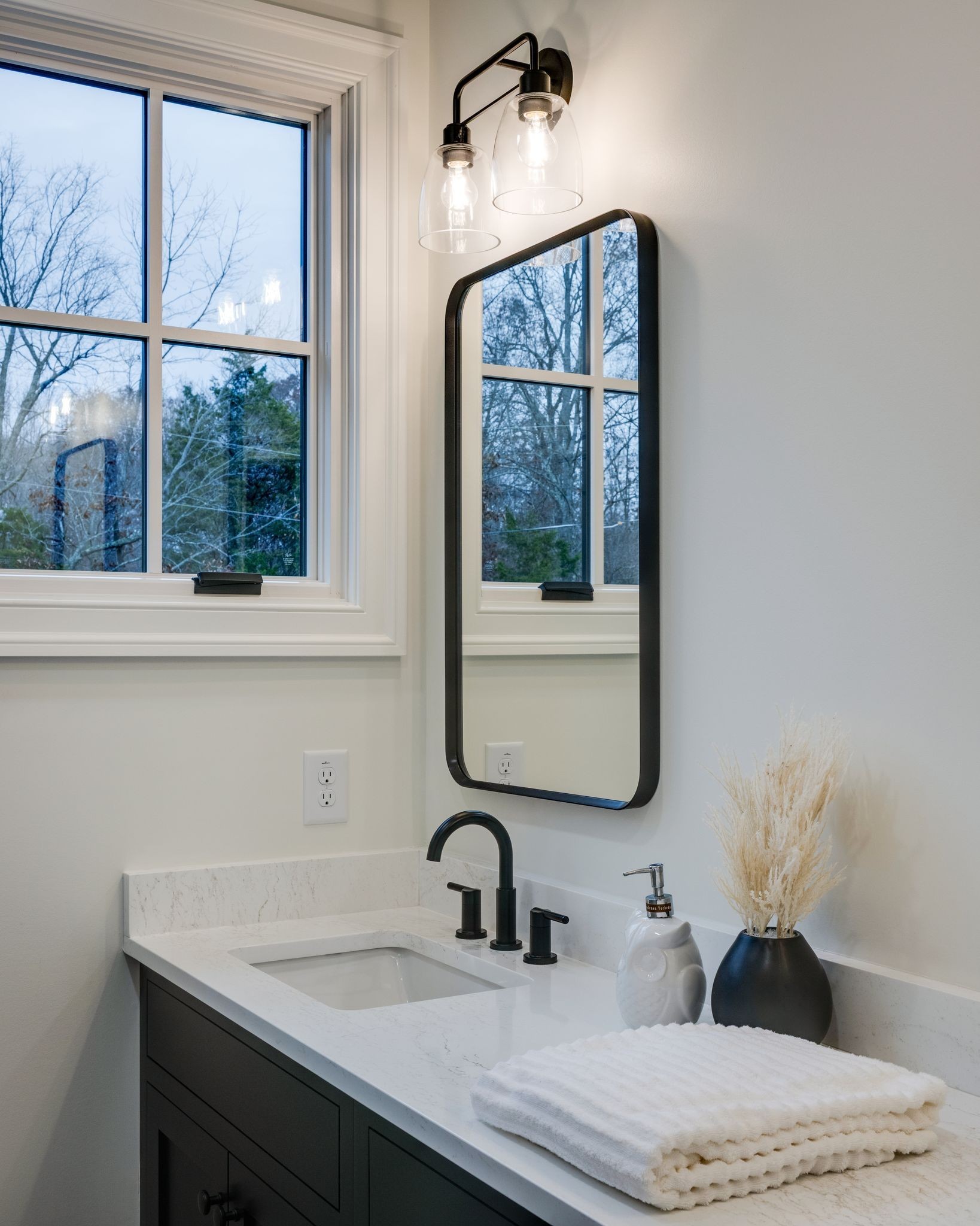 924 Hafner Road Charlotte, TN 37036 - Photo 57 of 79 a bathroom with a sink and a mirror