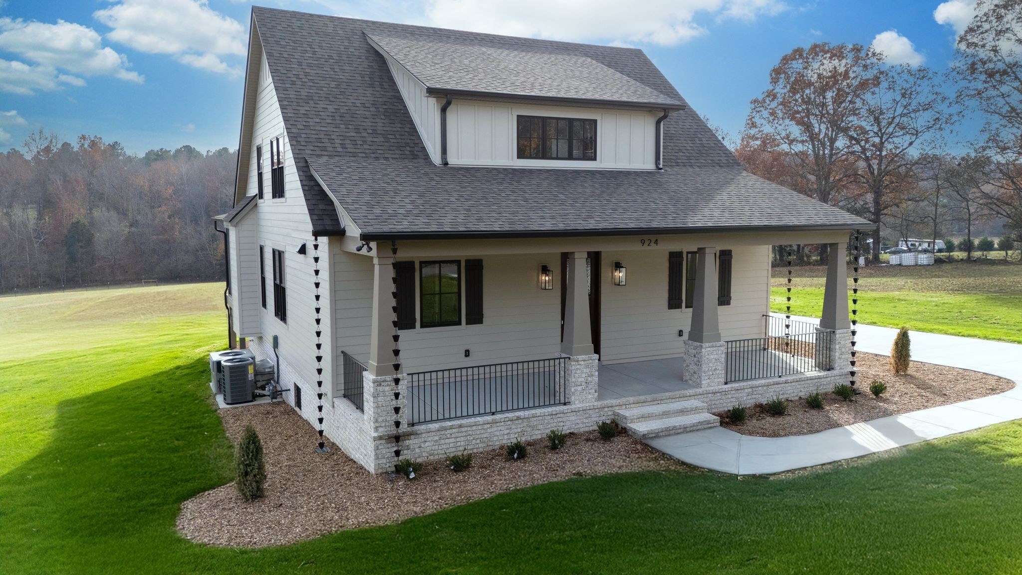 924 Hafner Road Charlotte, TN 37036 - Photo 64 of 79 a front view of a house with garden
