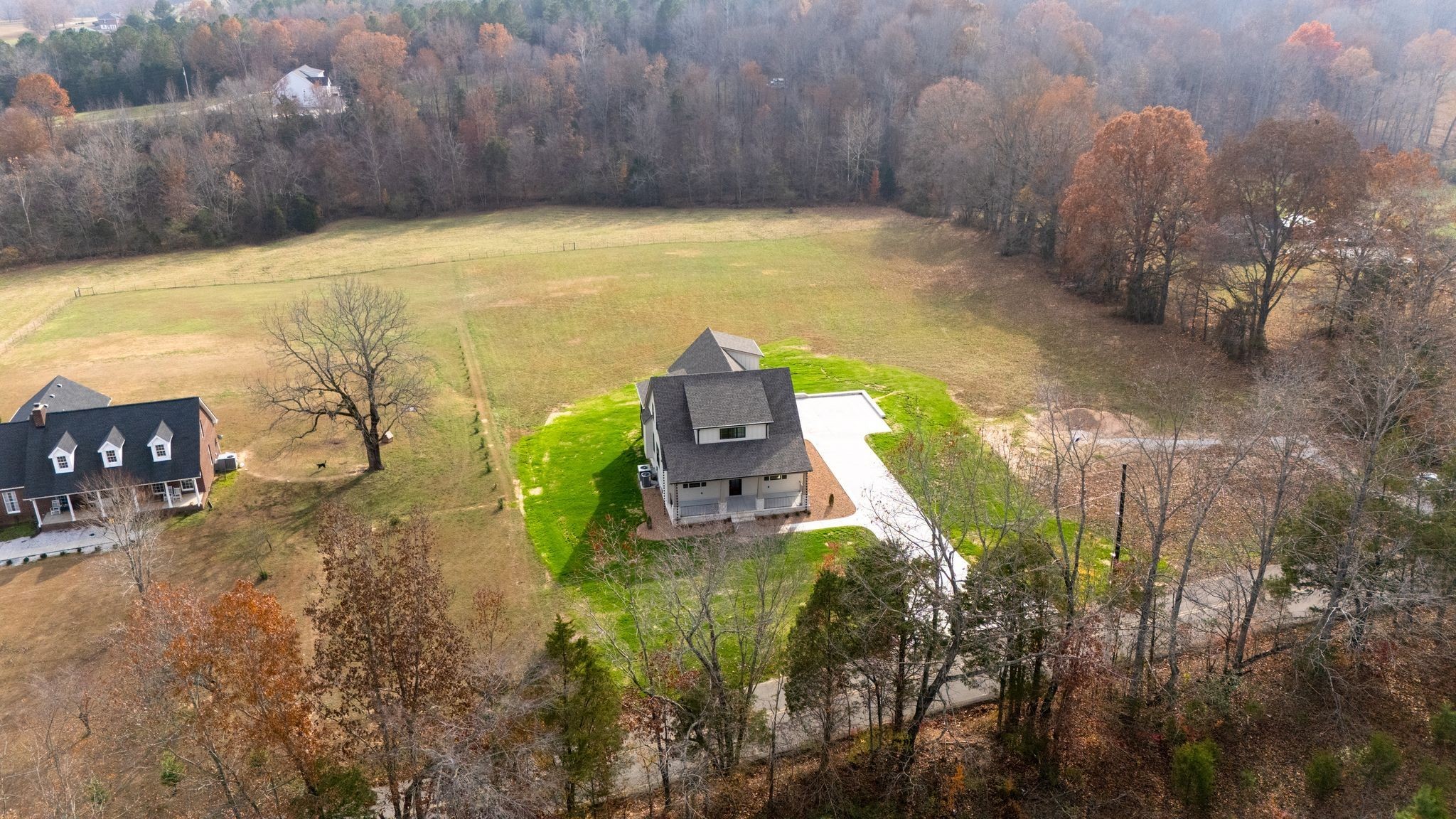 924 Hafner Road Charlotte, TN 37036 - Photo 65 of 79 a view of a swimming pool with lawn chairs and wooden fence