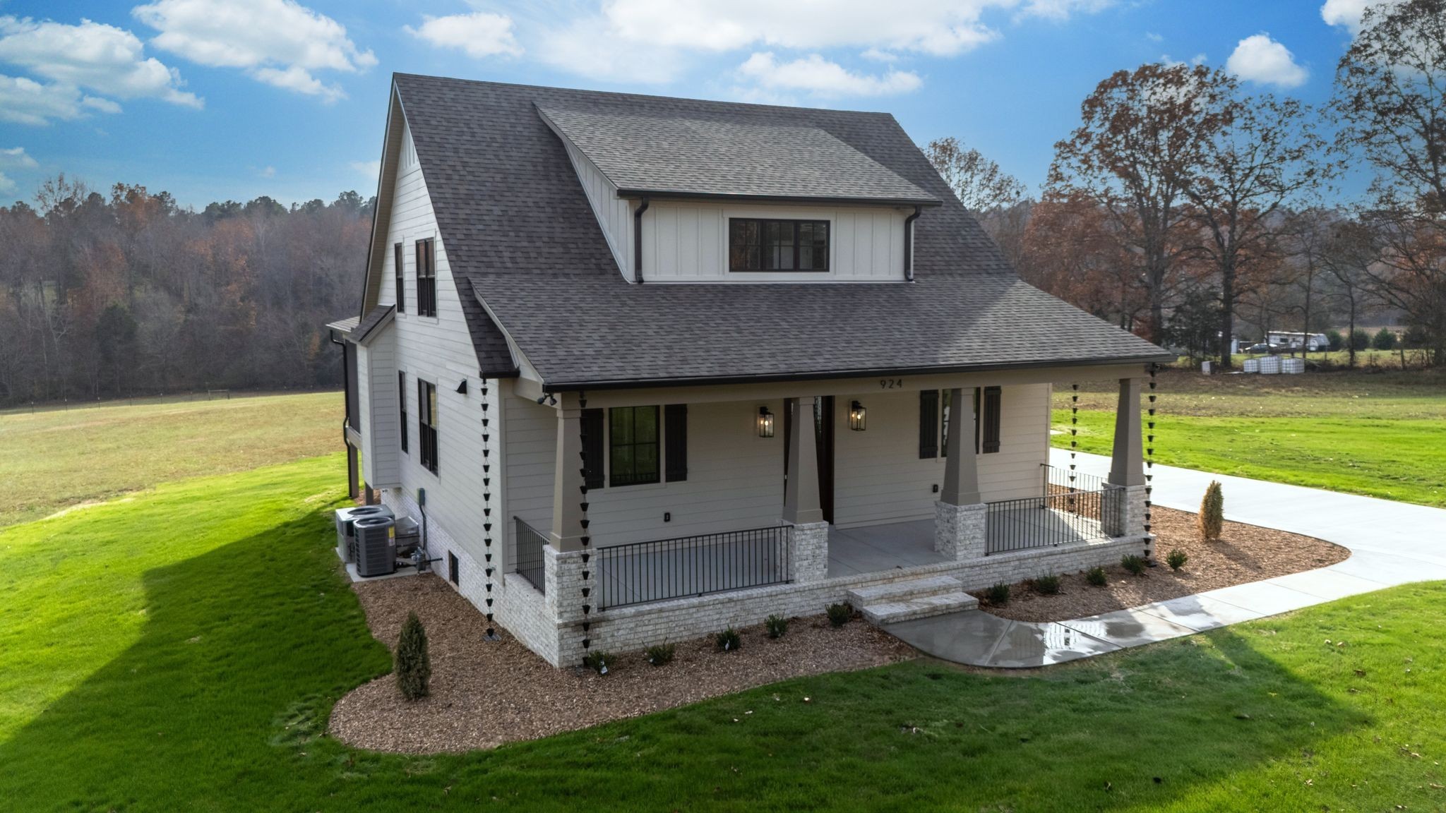 924 Hafner Road Charlotte, TN 37036 - Photo 72 of 79 a front view of a house with garden