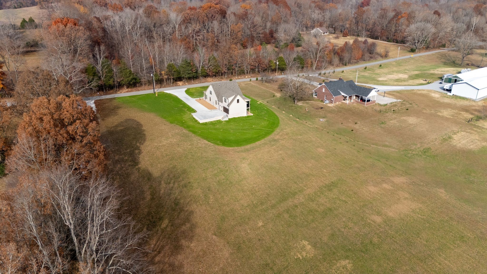 924 Hafner Road Charlotte, TN 37036 - Photo 75 of 79 a view of a backyard with large trees