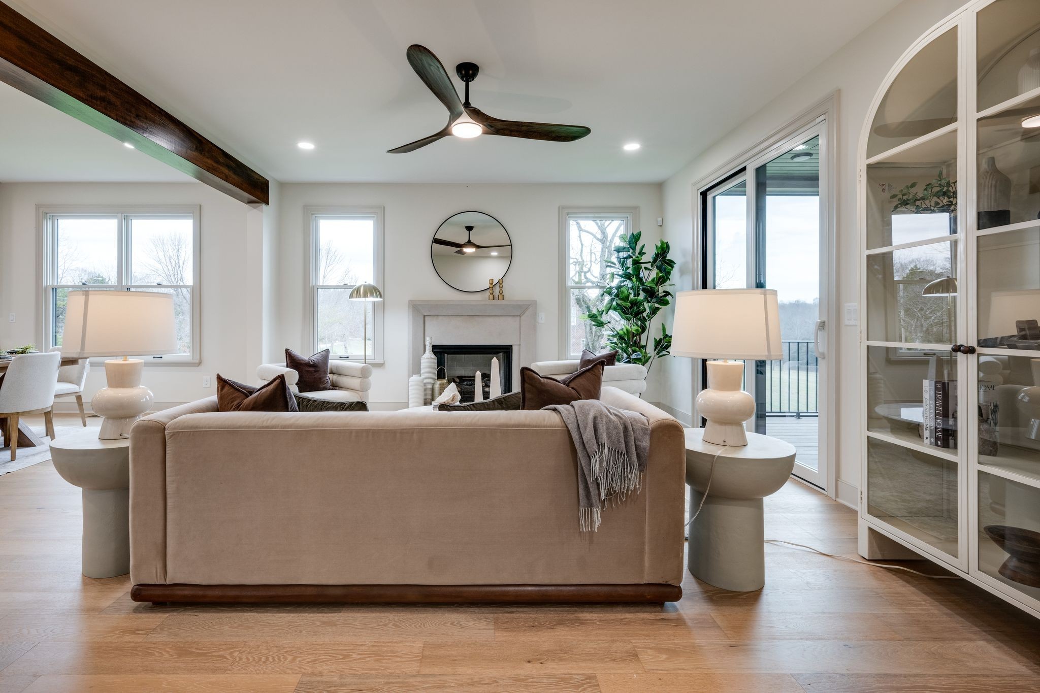 924 Hafner Road Charlotte, TN 37036 - Photo 9 of 79 a living room with furniture a fireplace and a large window
