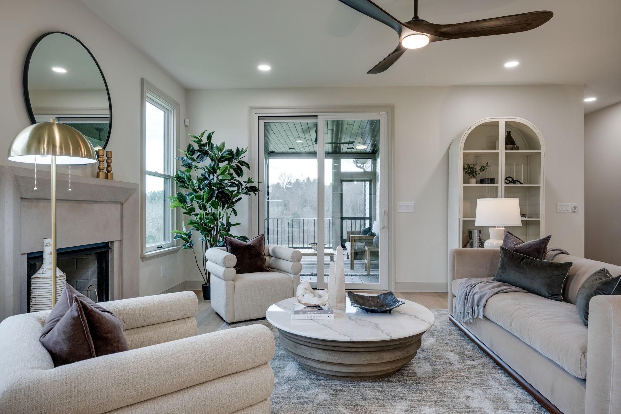 924 Hafner Road Charlotte, TN 37036 - Photo 10 of 79 a living room with furniture a fireplace and a large window