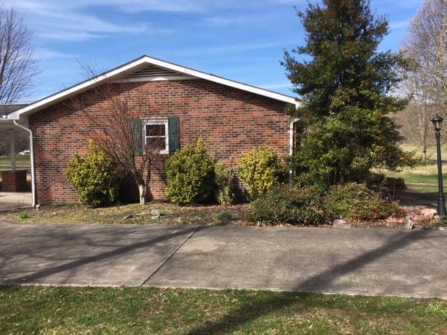 351 Lyons Road Bluff City, TN 37618 - Photo 16 of 22 LYONS LEFT SIDE OF HOUSE