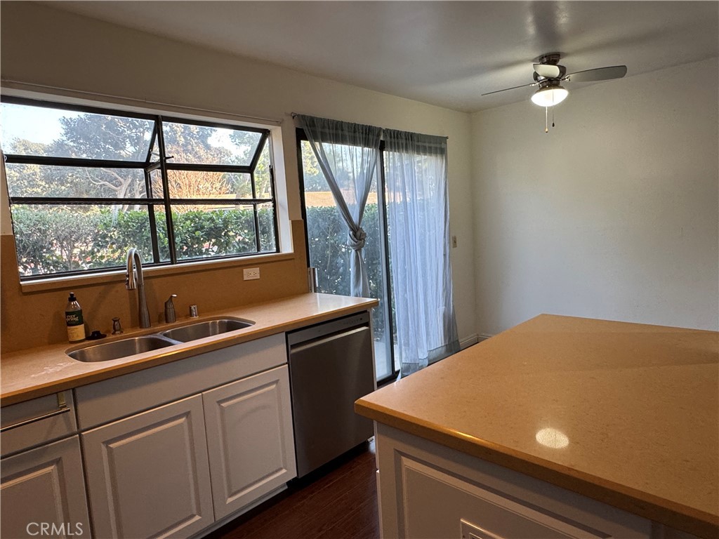 211 Springview Irvine, CA 92620 - Photo 4 of 12 a kitchen with a sink and large window