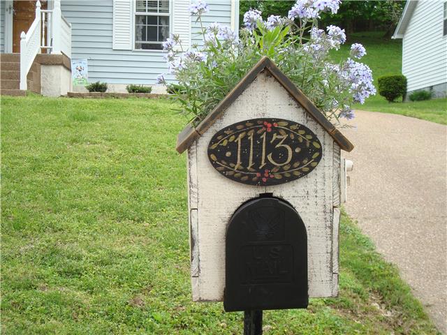 1113 Jacksons View Road Hermitage, TN 37076 - Photo 4 of 12 a view of a house with garden