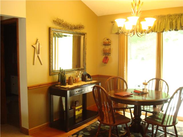 1113 Jacksons View Road Hermitage, TN 37076 - Photo 7 of 12 a view of a dining room with furniture and chandelier