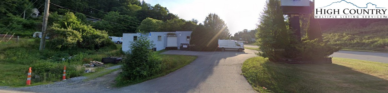 1846 U.S. Highway 421 South Boone, NC 28607 - Photo 11 of 19 a view of a house with a yard