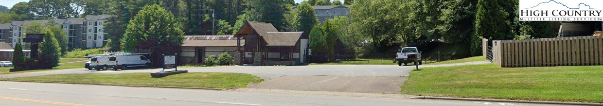 1846 U.S. Highway 421 South Boone, NC 28607 - Photo 4 of 19 a view of a house with a yard and tree s