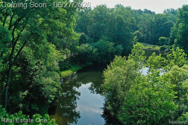 1222 Kings Cove Court, Unit 244 Rochester, MI 48306 - Photo 39 of 44 Natural waterscape part of King's Cove amenities'.