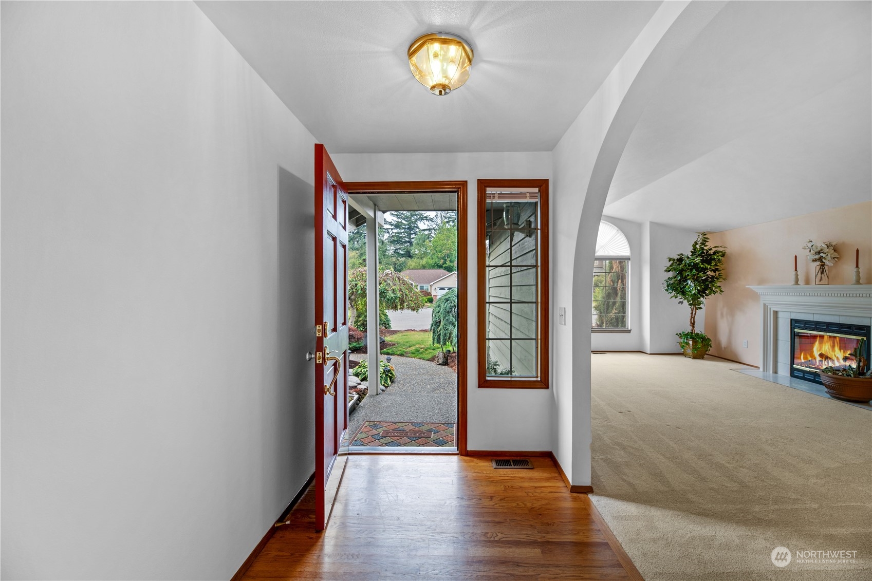 23115 14th Place West Bothell, WA 98021 - Photo 4 of 39 a view of an entryway with wooden floor