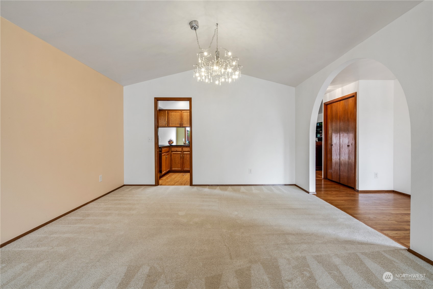 23115 14th Place West Bothell, WA 98021 - Photo 6 of 39 a view of an empty room with window and chandelier