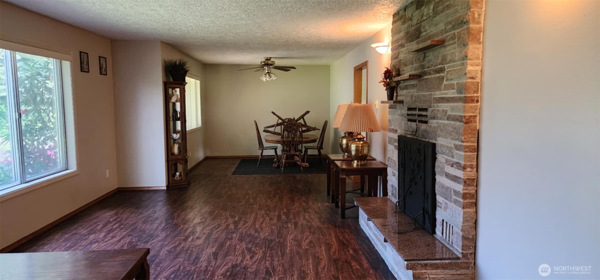 314 Insel Road Woodland, WA 98674 - Photo 16 of 32 a dining room with furniture entryway and wooden floor