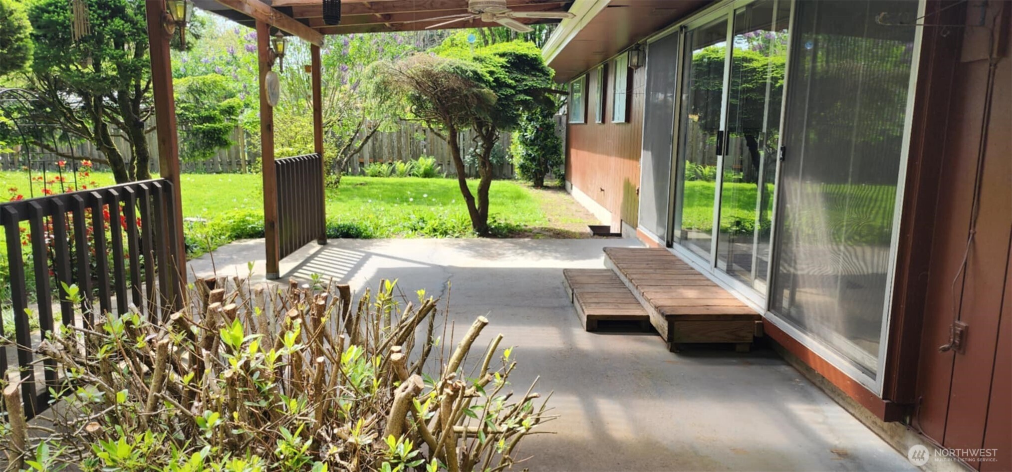 314 Insel Road Woodland, WA 98674 - Photo 3 of 32 a view of backyard with a garden and trees