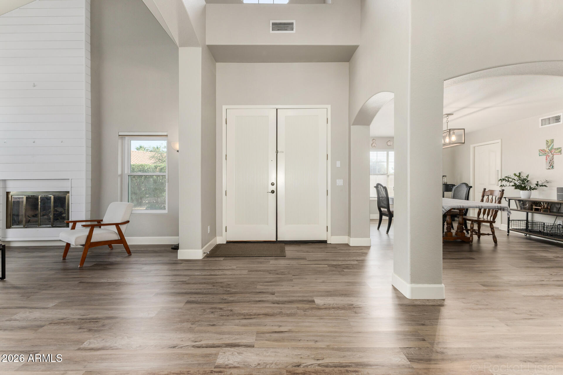 314 South Sandstone Street Gilbert, AZ 85296 - Photo 14 of 58 a view of a livingroom with furniture and a floor to ceiling window