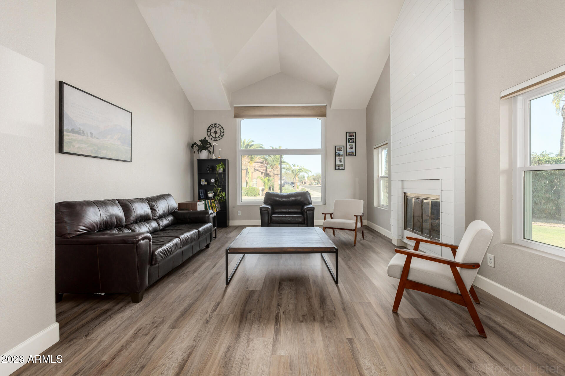 314 South Sandstone Street Gilbert, AZ 85296 - Photo 15 of 58 a living room with furniture and a wooden floor