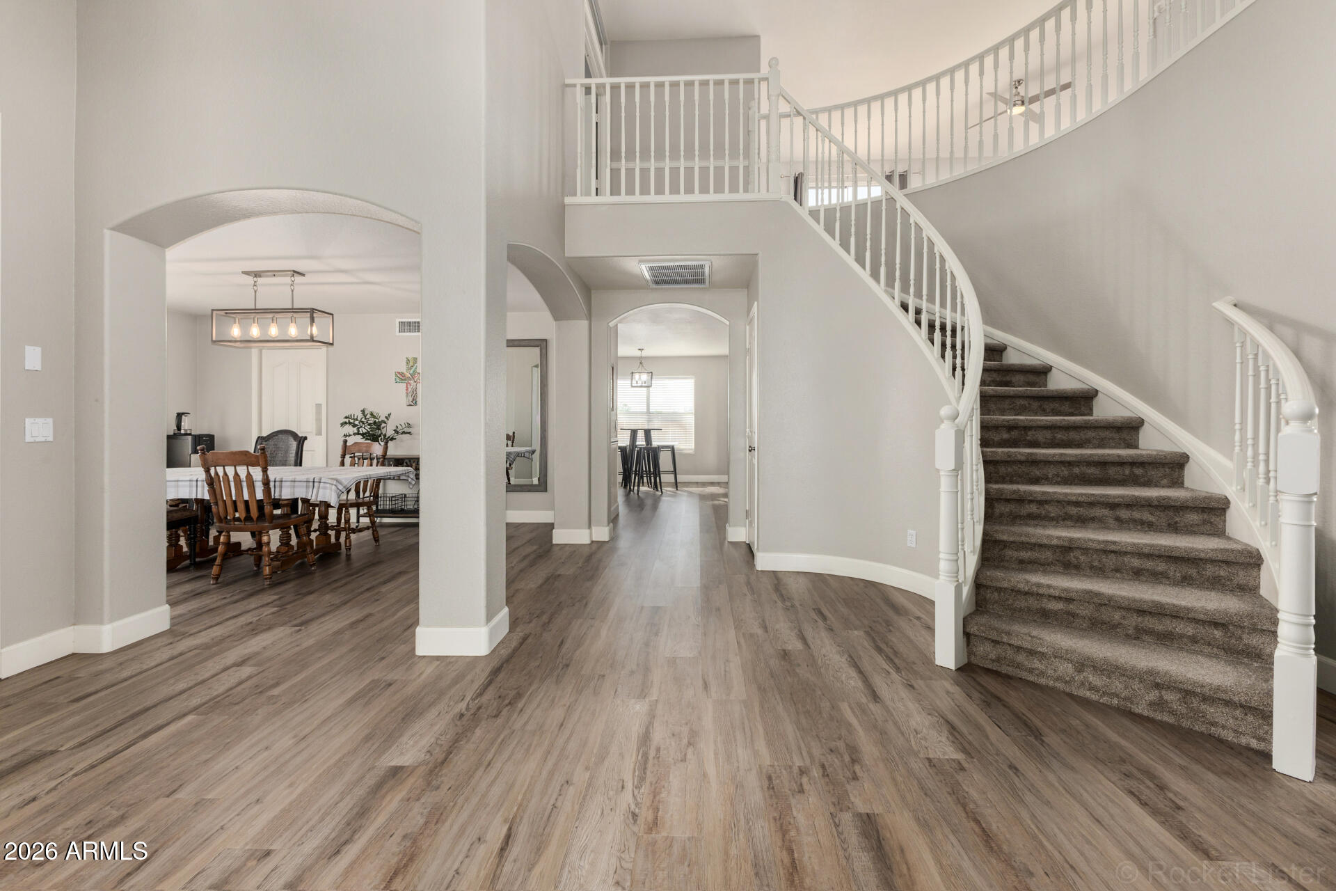 314 South Sandstone Street Gilbert, AZ 85296 - Photo 17 of 58 a view of entryway and hall with wooden floor