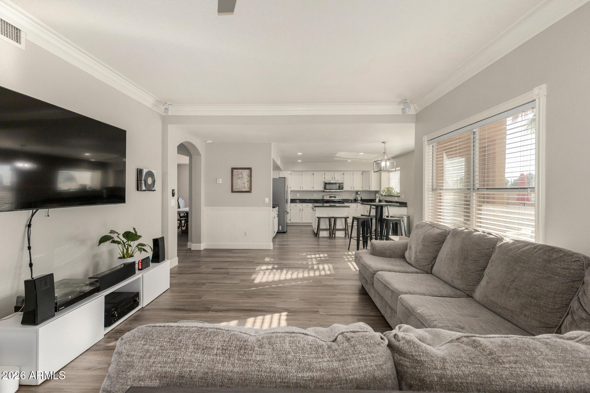 314 South Sandstone Street Gilbert, AZ 85296 - Photo 20 of 58 a living room with furniture and a flat screen tv