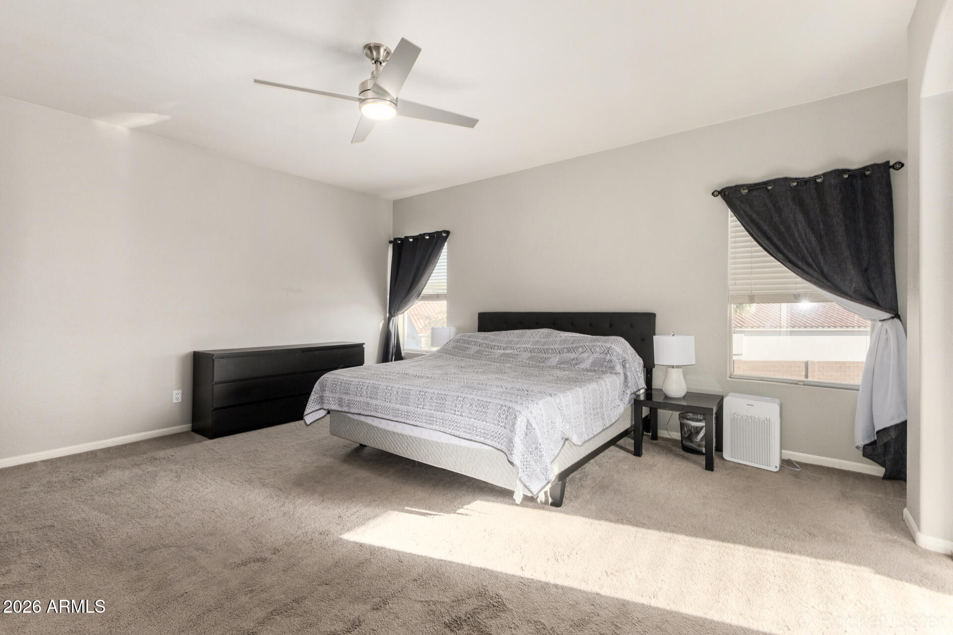 314 South Sandstone Street Gilbert, AZ 85296 - Photo 28 of 58 a bedroom with a bed and a ceiling fan