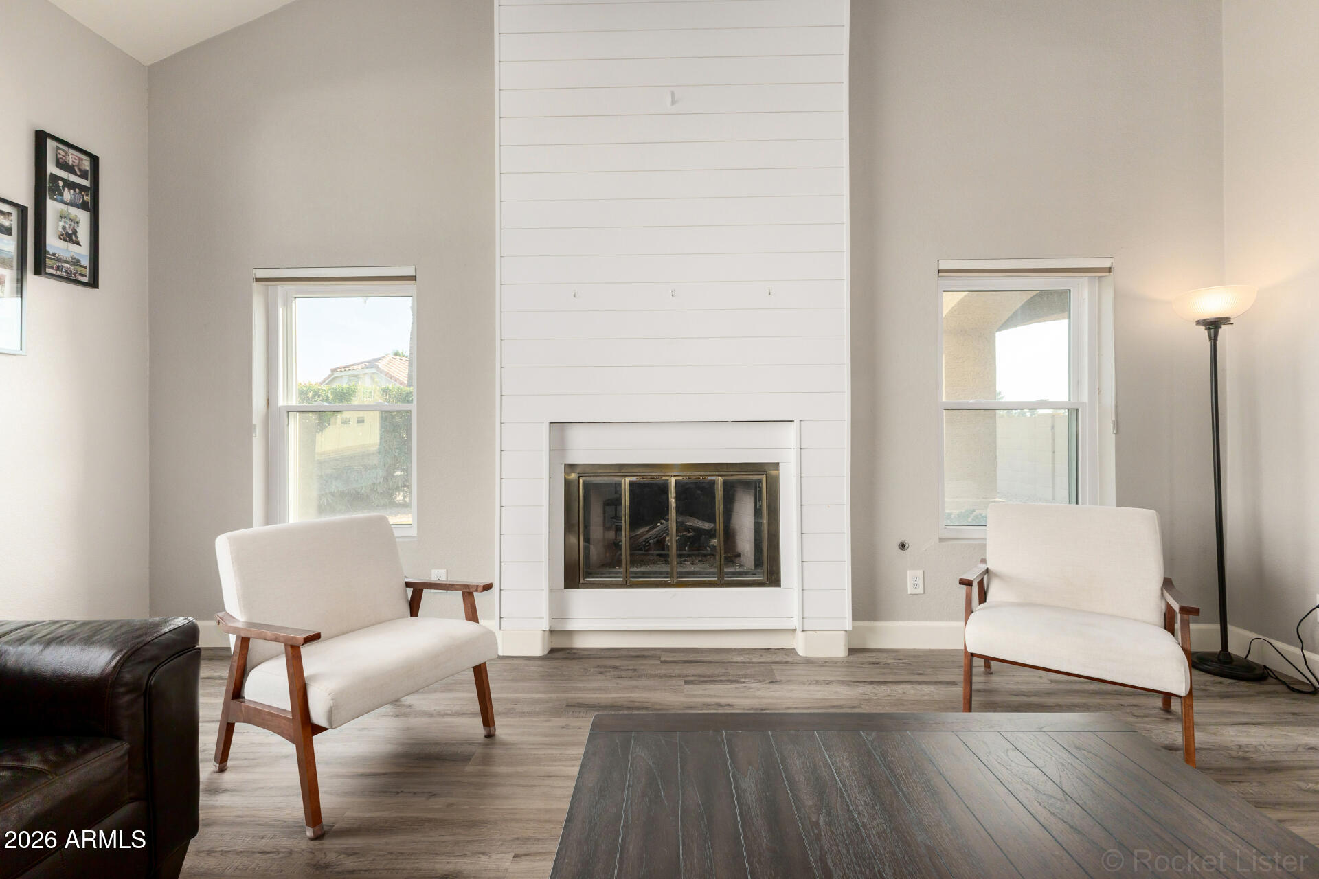 314 South Sandstone Street Gilbert, AZ 85296 - Photo 2 of 58 a living room with furniture and a fireplace