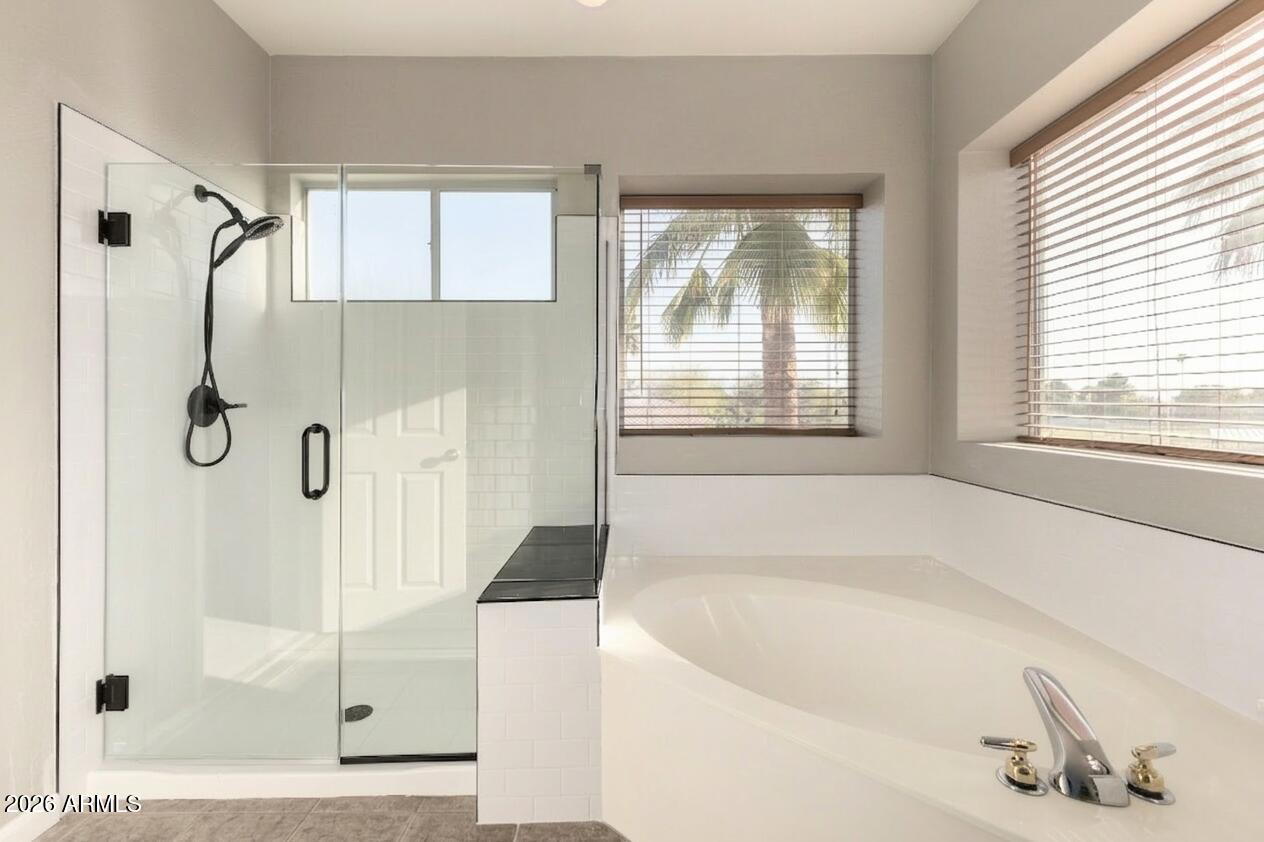 314 South Sandstone Street Gilbert, AZ 85296 - Photo 31 of 58 a white bath tub sitting next to a shower