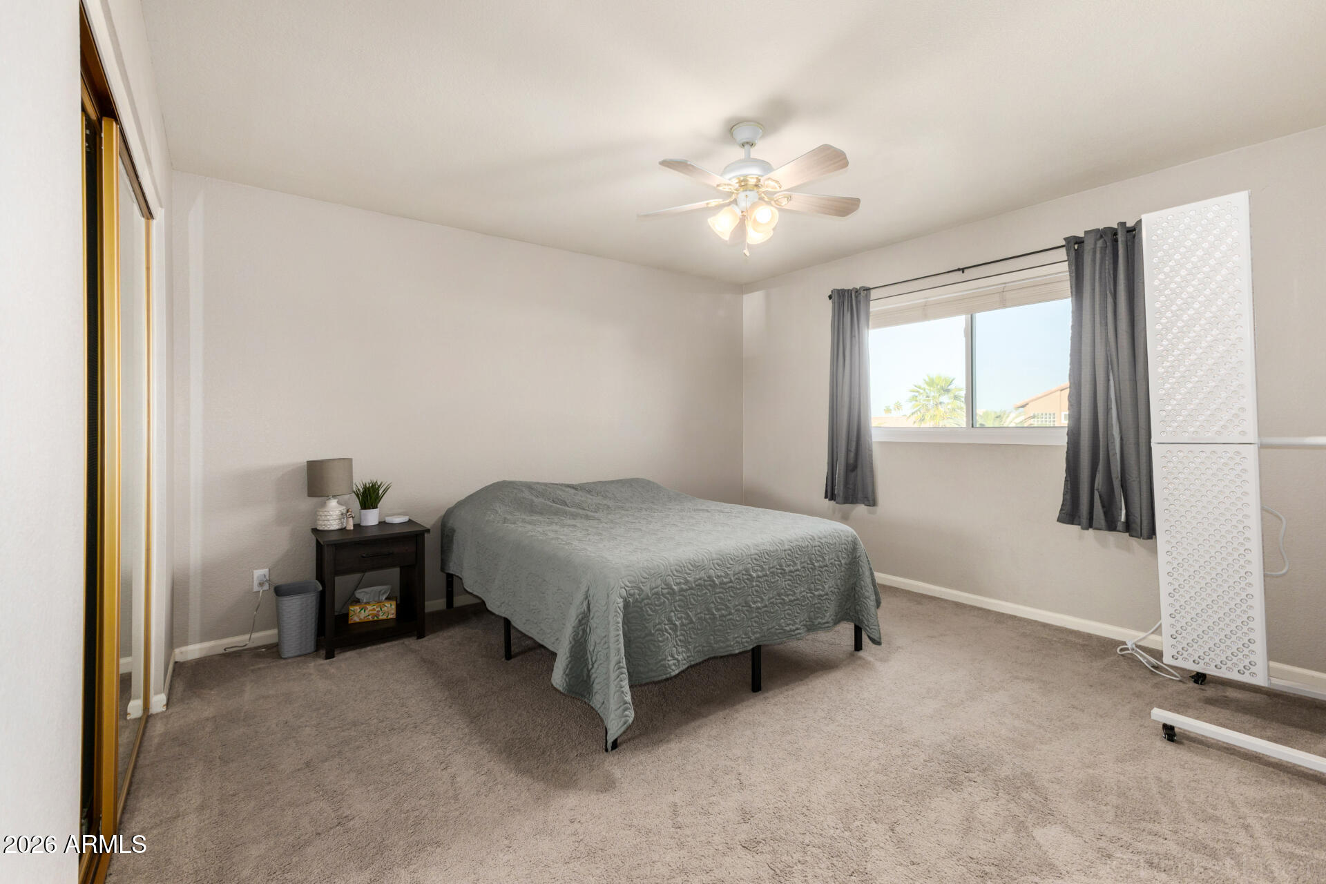 314 South Sandstone Street Gilbert, AZ 85296 - Photo 34 of 58 a bedroom with a bed and a chandelier