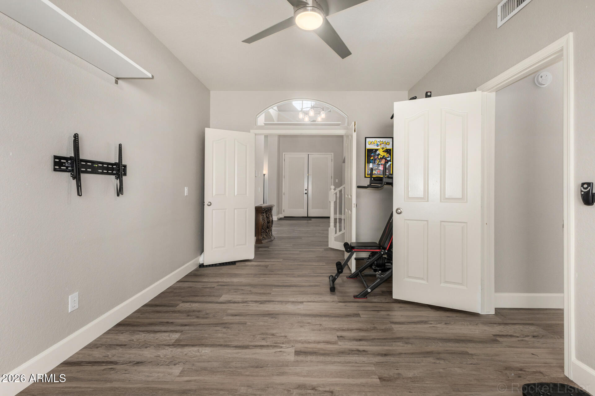 314 South Sandstone Street Gilbert, AZ 85296 - Photo 39 of 58 a view of a room with wooden floor and ceiling fan