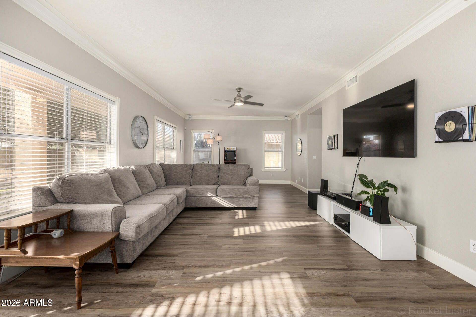 314 South Sandstone Street Gilbert, AZ 85296 - Photo 3 of 58 a living room with furniture and a flat screen tv
