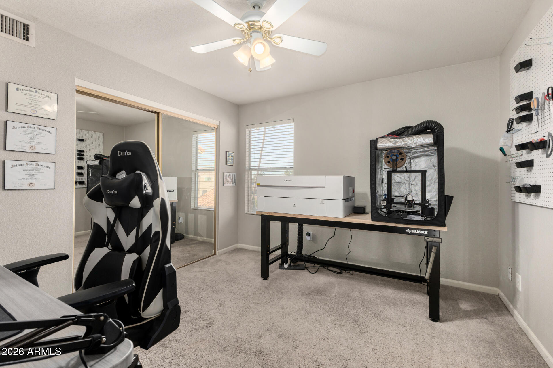 314 South Sandstone Street Gilbert, AZ 85296 - Photo 41 of 58 a view of a workspace with furniture and gym equipment