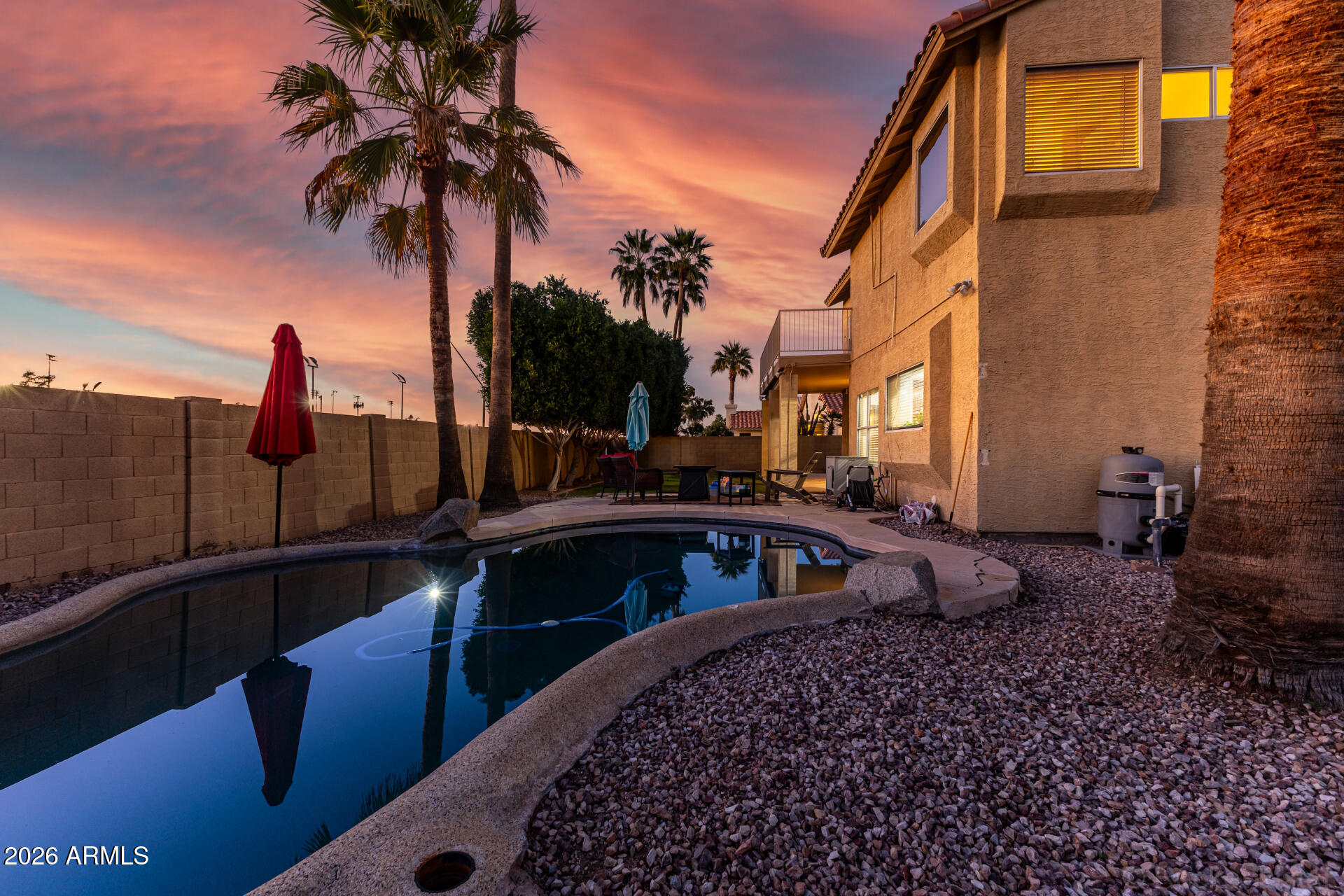 314 South Sandstone Street Gilbert, AZ 85296 - Photo 49 of 58 a front view of a house with balcony and trees
