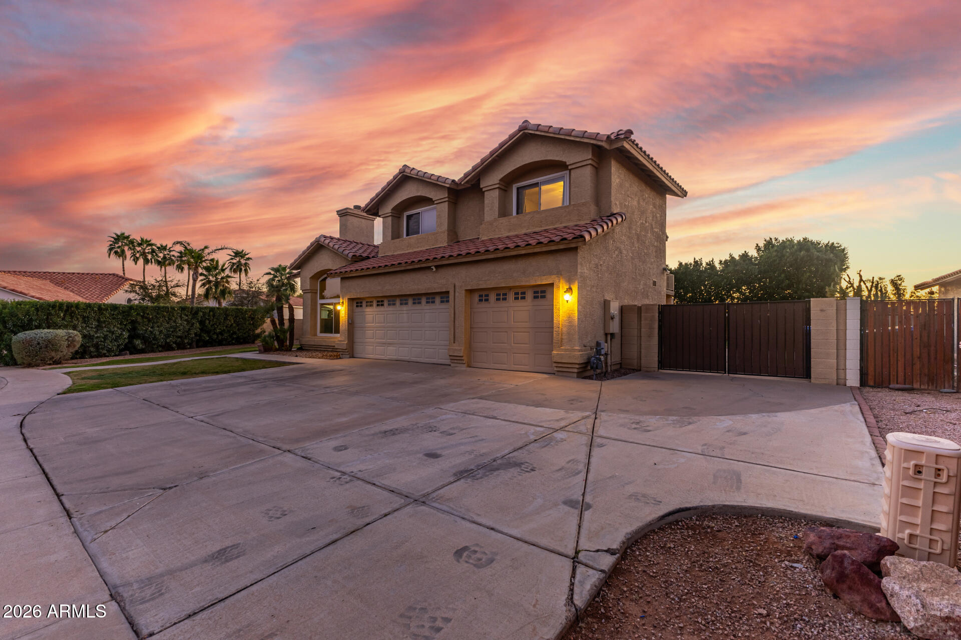 314 South Sandstone Street Gilbert, AZ 85296 - Photo 8 of 58 a front view of a house with a yard and garage