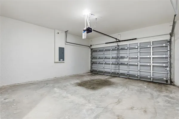 a view of an empty room with a fireplace
