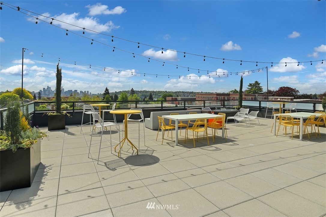 1601 North 45th Street, Unit 411 Seattle, WA 98103 - Photo 7 of 33 a view of a swimming pool and outdoor seating
