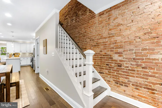 a view of entryway with wooden floor