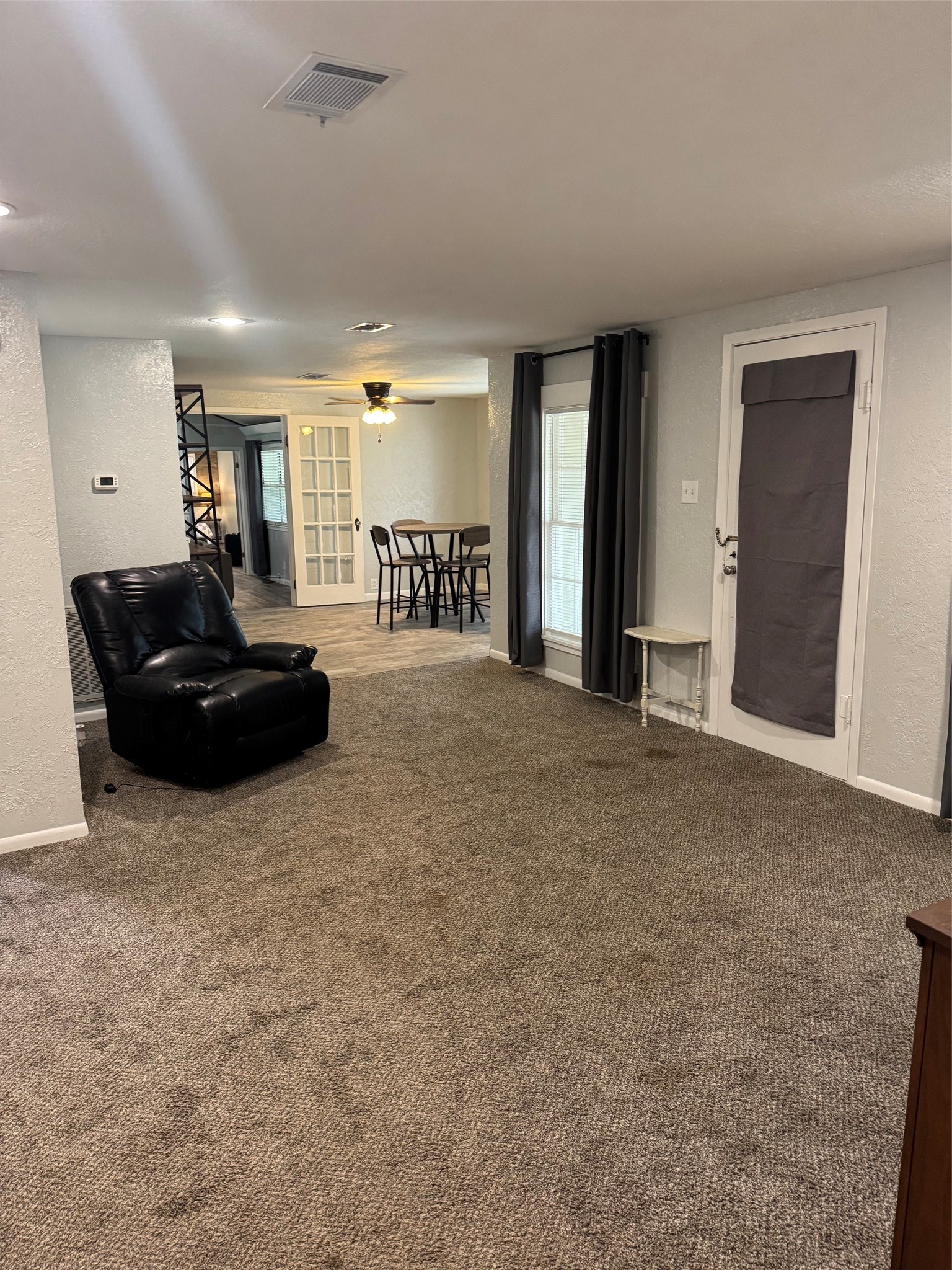 9004 Farm To Market 62 Corrigan, TX 75939 - Photo 8 of 27 a living room with furniture and a window
