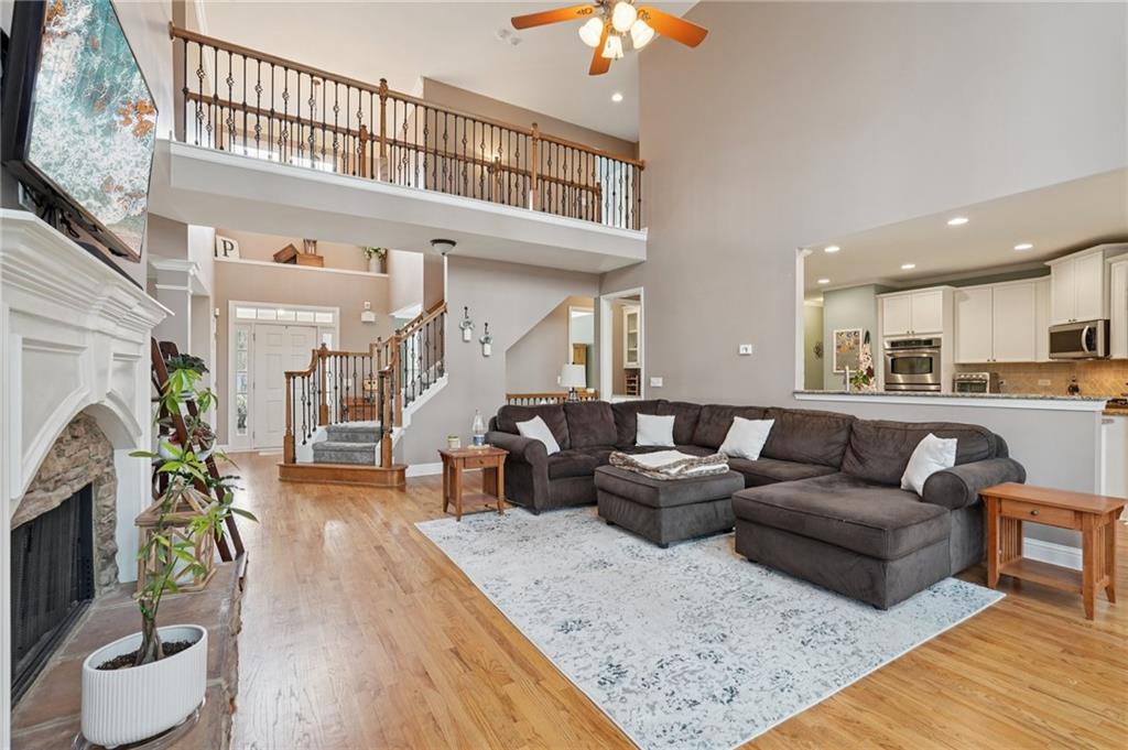 788 Highcrest Drive Acworth, GA 30101 - Photo 11 of 103 a living room with furniture and a fireplace