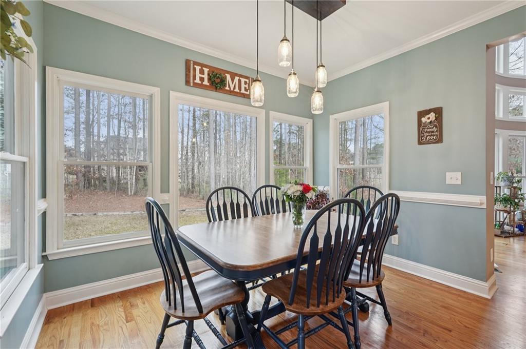 788 Highcrest Drive Acworth, GA 30101 - Photo 15 of 103 a view of a dining room with furniture window and wooden floor