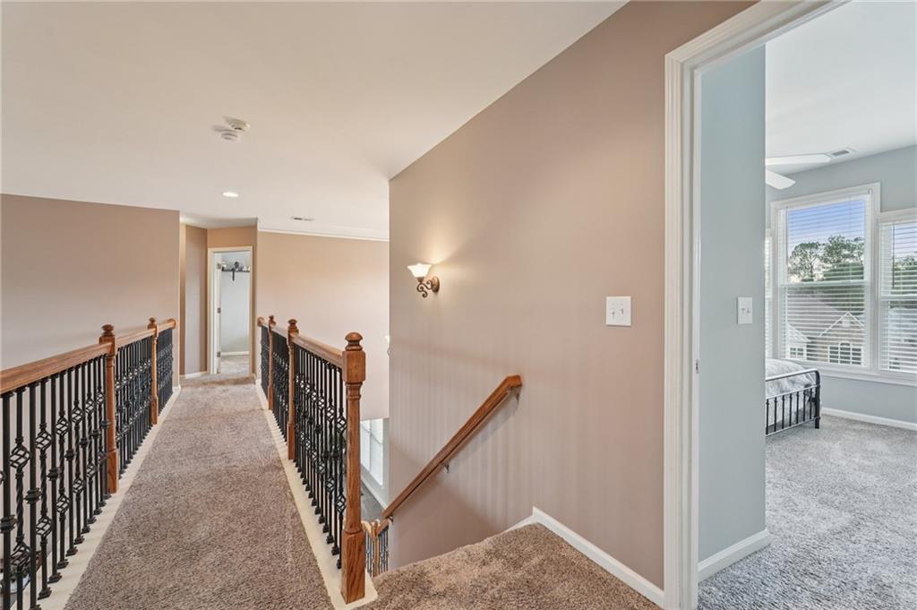 788 Highcrest Drive Acworth, GA 30101 - Photo 44 of 103 a view of a hallway with windows