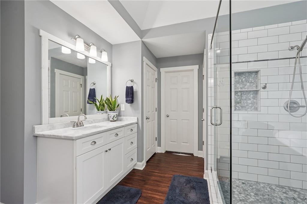 788 Highcrest Drive Acworth, GA 30101 - Photo 58 of 103 a bathroom with a granite countertop sink mirror and shower