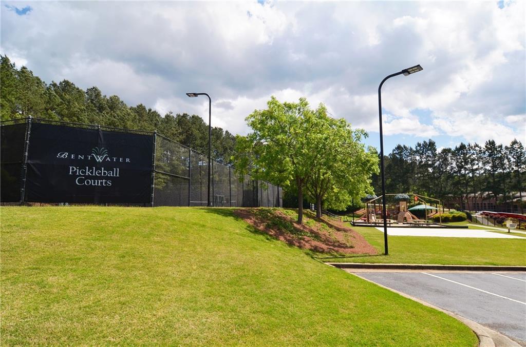 788 Highcrest Drive Acworth, GA 30101 - Photo 97 of 103 a view of a park with swings and slides