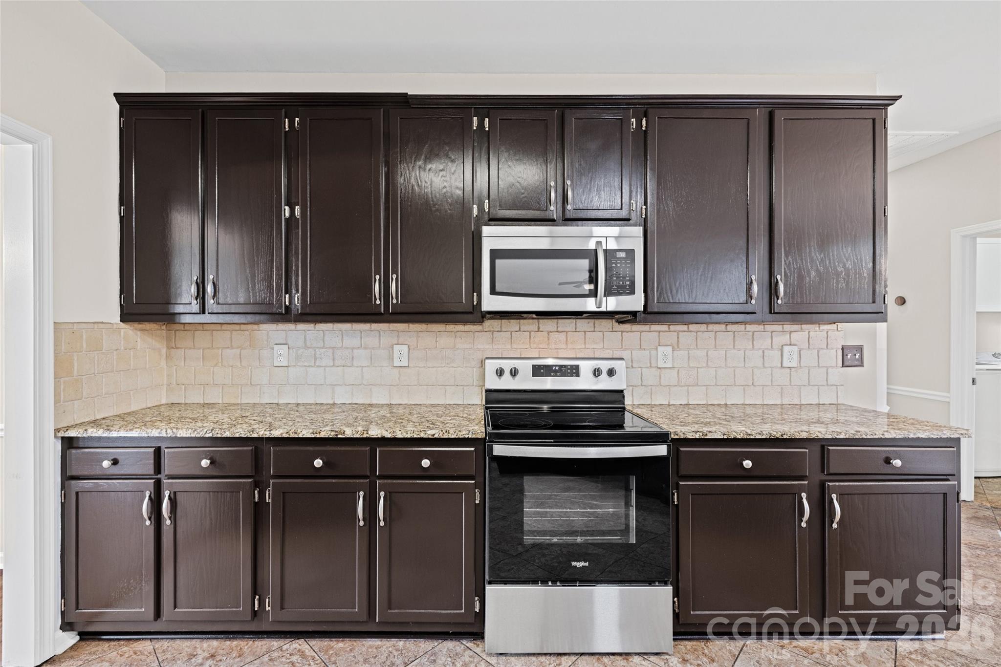 620 East Cheval Drive Fort Mill, SC 29708 - Photo 17 of 48 a kitchen with a sink and cabinets