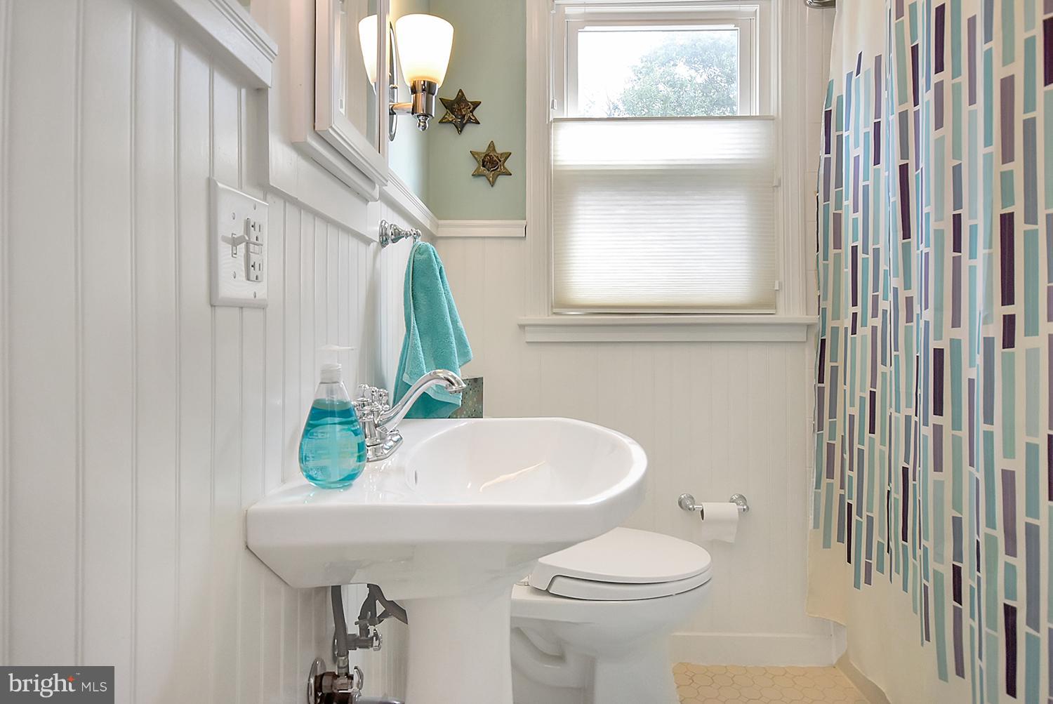 2605 Terrapin Road Silver Spring, MD 20906 - Photo 12 of 30 a bathroom with a sink and a mirror