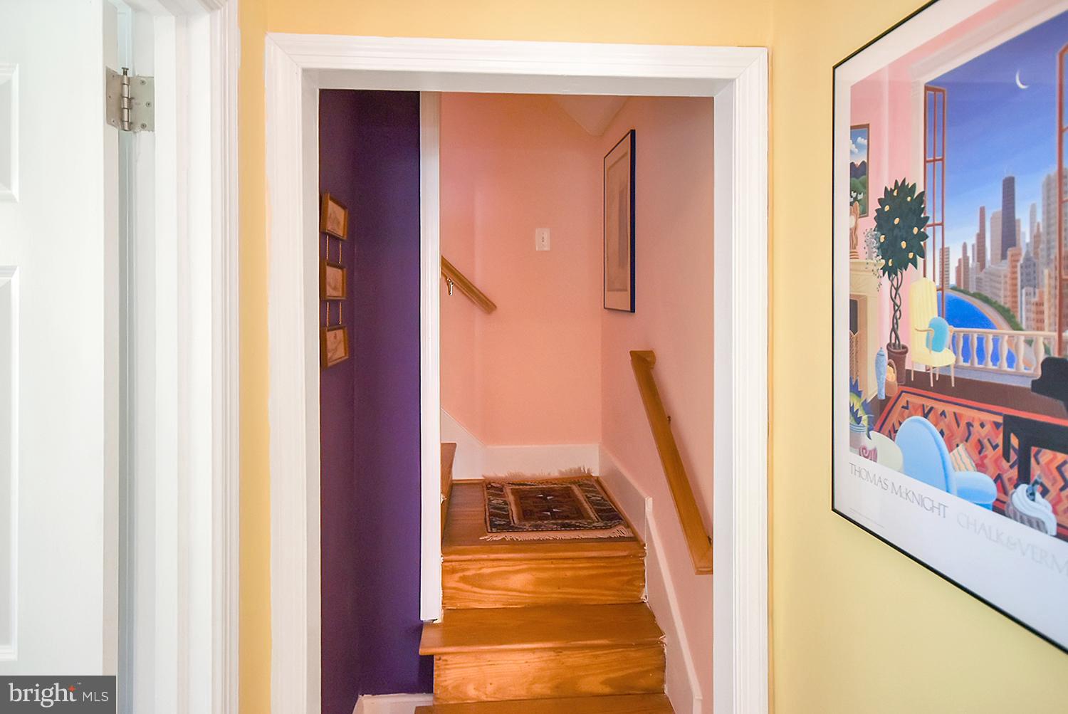 2605 Terrapin Road Silver Spring, MD 20906 - Photo 14 of 30 a view of a hallway with wooden floor and stairs