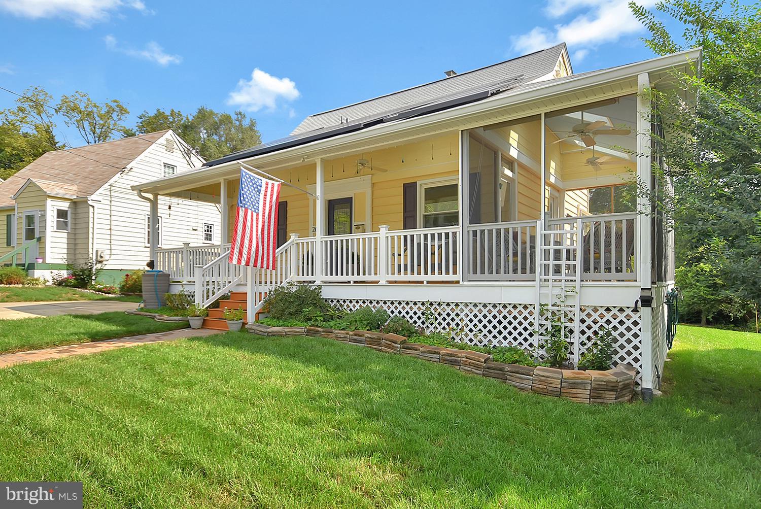 2605 Terrapin Road Silver Spring, MD 20906 - Photo 3 of 30 a front view of a house with a garden