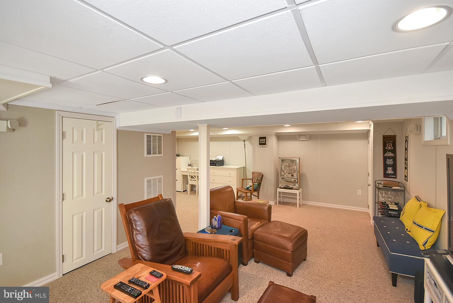 2605 Terrapin Road Silver Spring, MD 20906 - Photo 22 of 30 a living room with furniture and a mirror