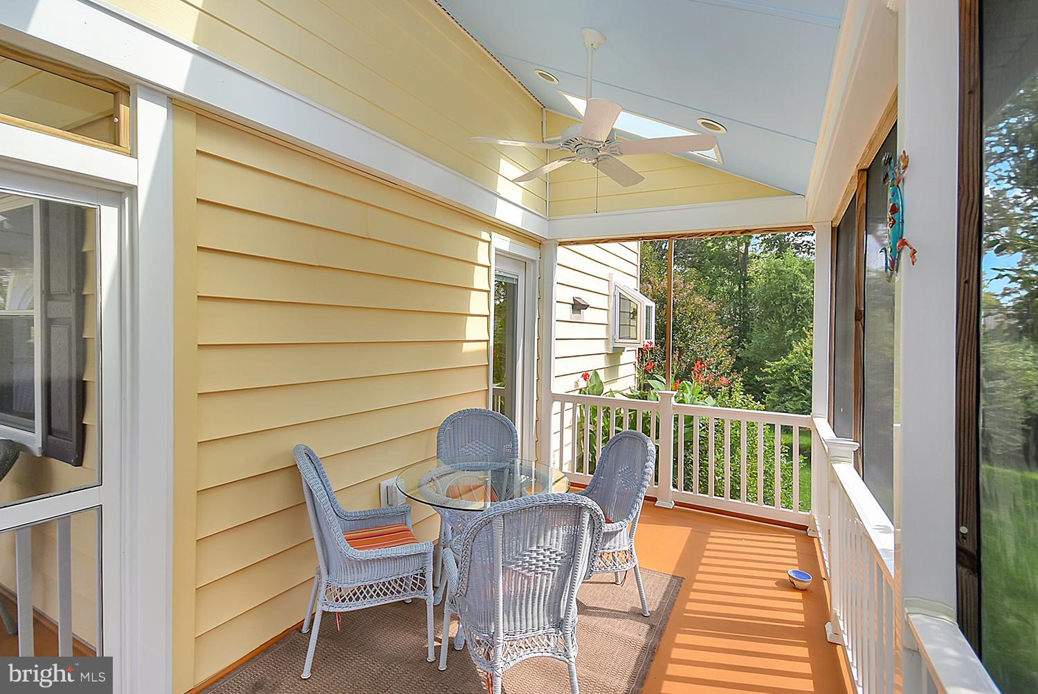 2605 Terrapin Road Silver Spring, MD 20906 - Photo 30 of 30 a view of a porch with furniture and wooden floor