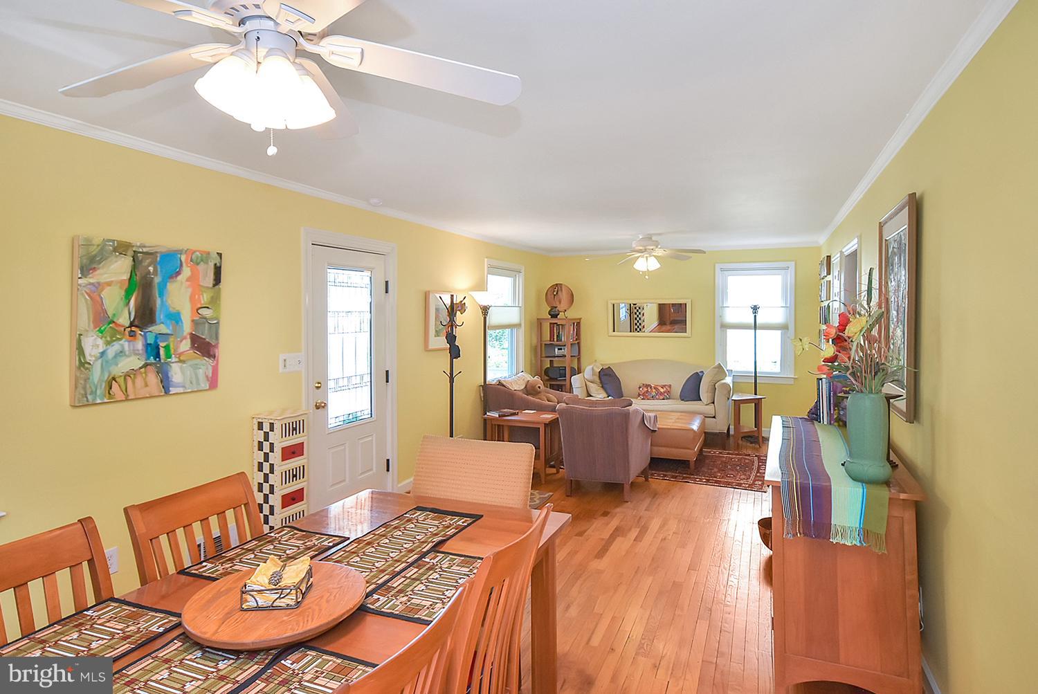 2605 Terrapin Road Silver Spring, MD 20906 - Photo 8 of 30 a living room with furniture and a chandelier