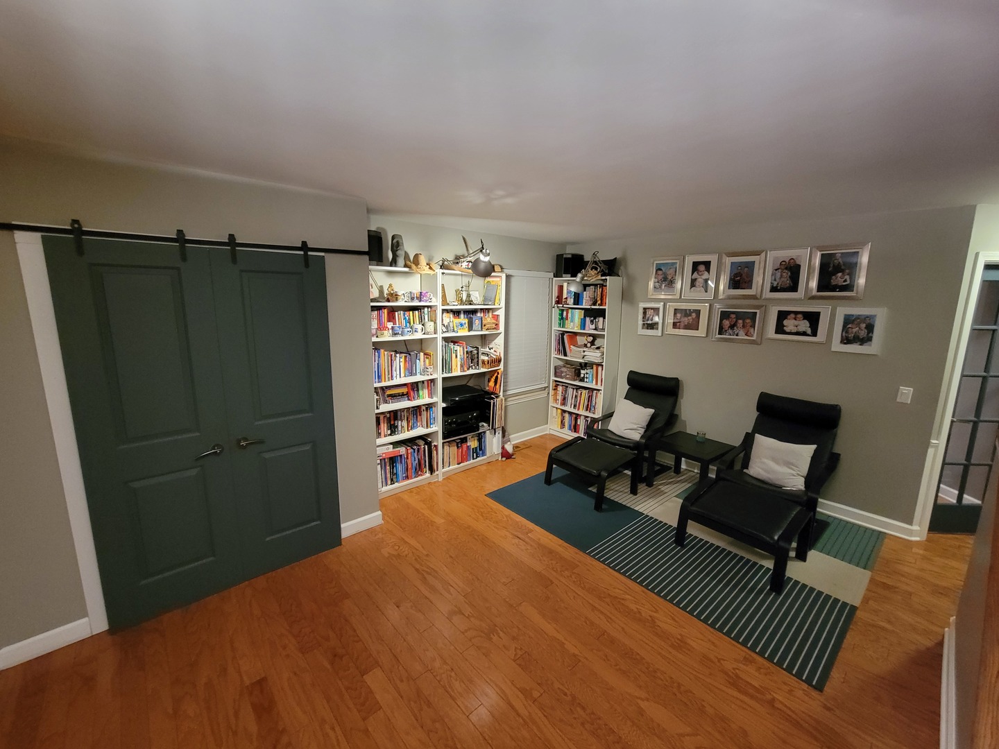 515 Surrey Ridge Drive Cary, IL 60013 - Photo 25 of 71 a bedroom with a bed and a book shelf
