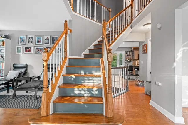 a white toilet sitting next to a bathroom sink