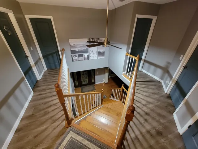 a bathroom with a sink a mirror and a vanity